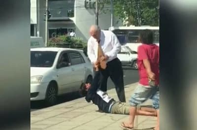 Violenta gresca entre juez y limpiavidrios
