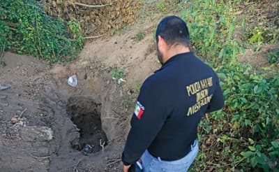 Hallan 75 bolsas de restos humanos en fosas clandestinas
