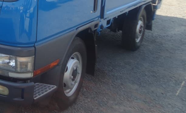 Niño muere arrollado por camión conducido por su padre