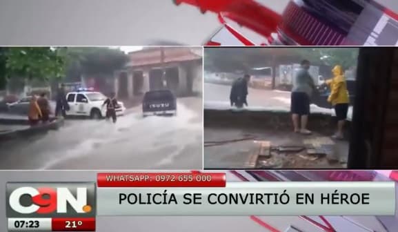 Condecoran a policía que socorrió a conductor en medio del raudal