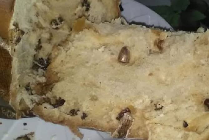 Bala perdida quedó dentro de pan dulce durante cena de fin de año