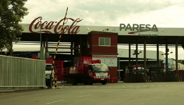 Confirman contagios en empresa vial y fabricante de Coca Cola