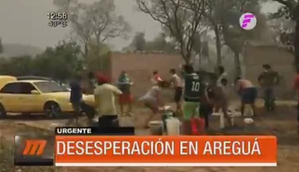 Vecinos intentan apagar incendio en Areguá