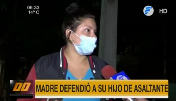 Madre defiende a su hijo de delincuente y resulta con heridas