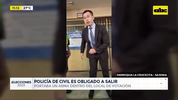 Policía de civil “armado” ingresa a local de votación 